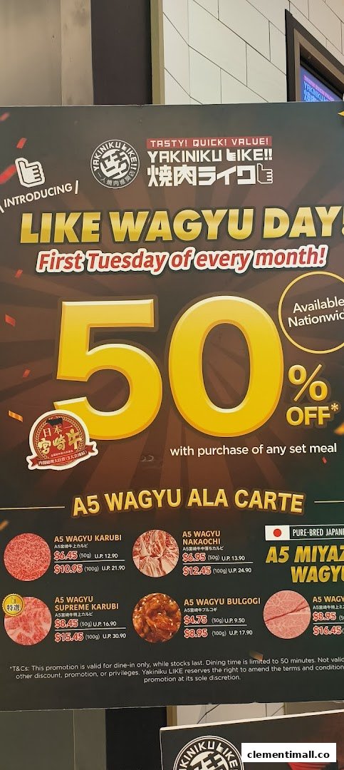 A promotional menu board for Yakiniku Like, featuring A5 Wagyu ala carte items and a 'Like Wagyu Day' discount.