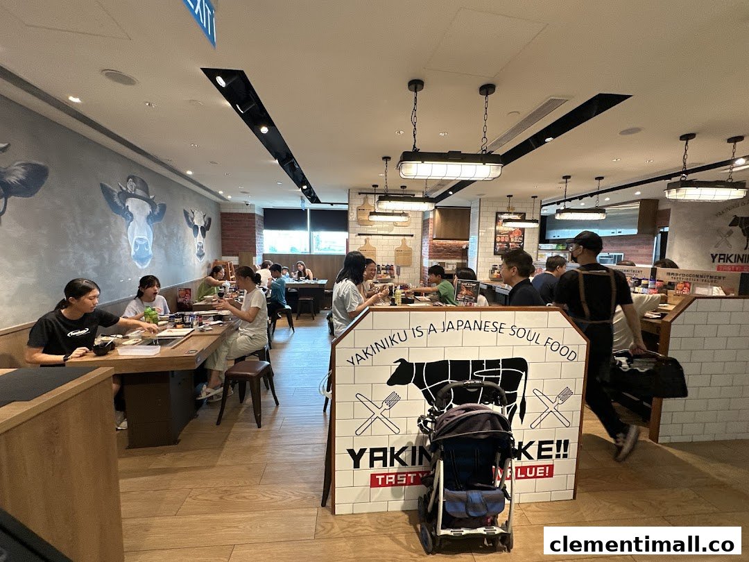 A lively interior view of Yakiniku Like, showing customers enjoying their meals in a modern setting.