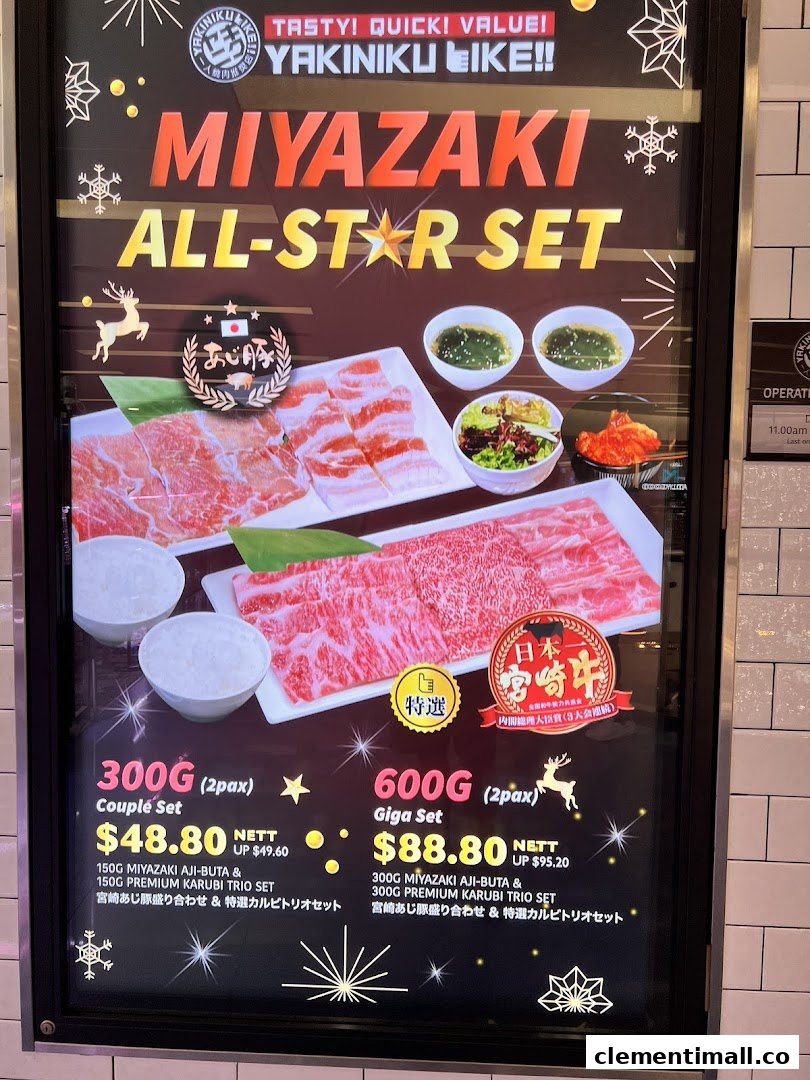 A vibrant promotional display showcasing Yakiniku Like's Miyazaki All-Star beef sets.