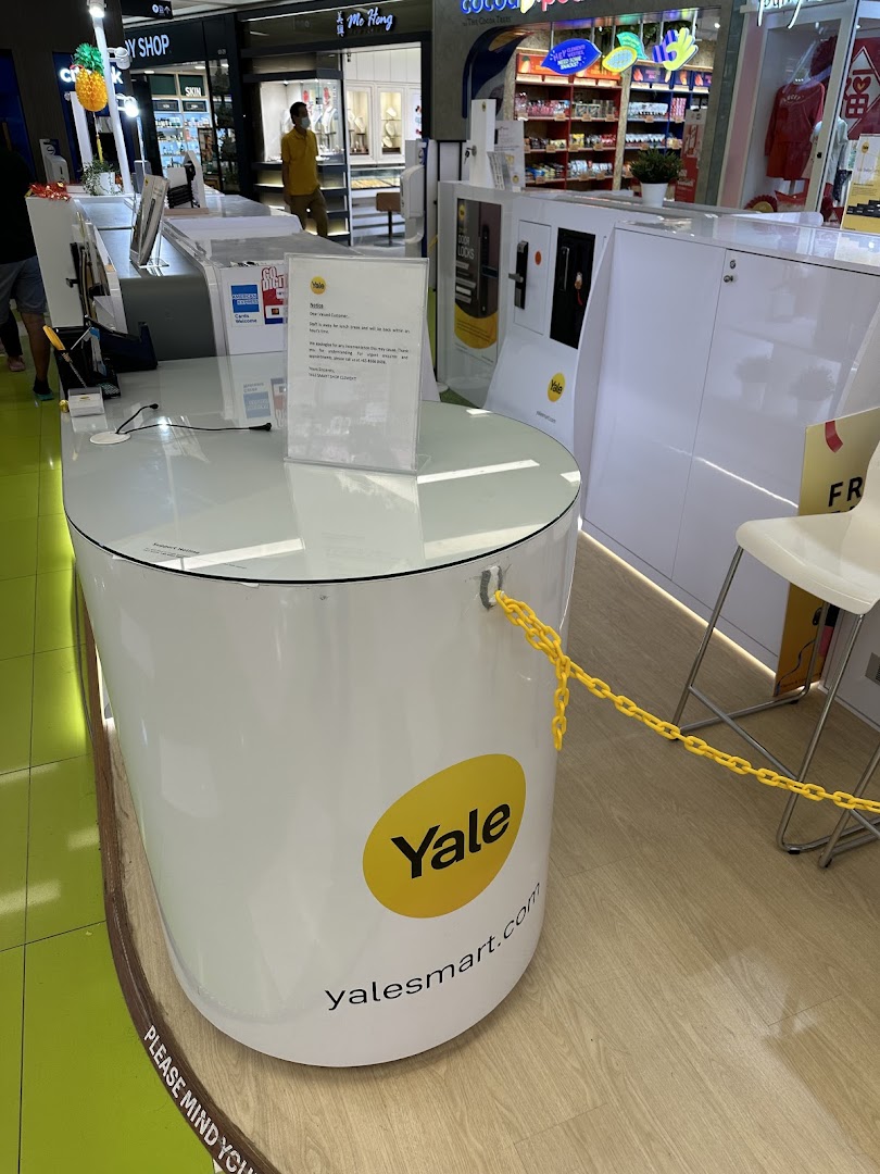 An interior view of the Yale Smart Shop kiosk showcasing smart door locks and security solutions.