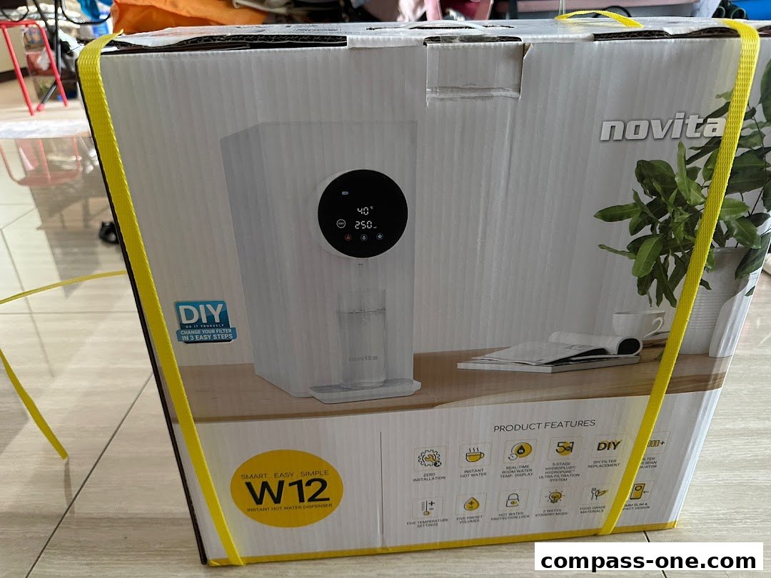 A Novita W12 instant hot water dispenser box with product features listed.