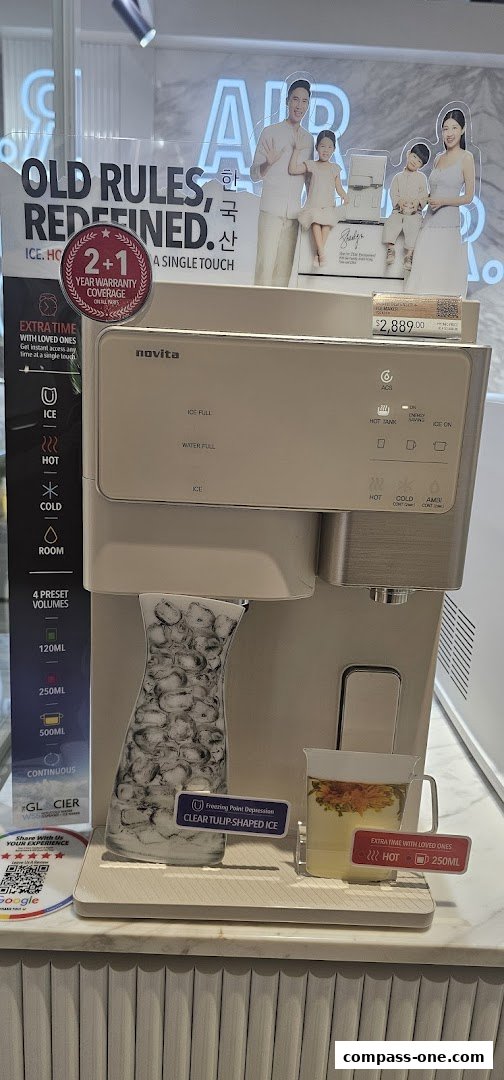 A Novita water dispenser with various temperature settings and ice options.