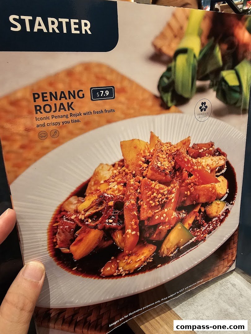 A menu item for Penang Rojak, a starter dish with fresh fruits and crispy you tiao.