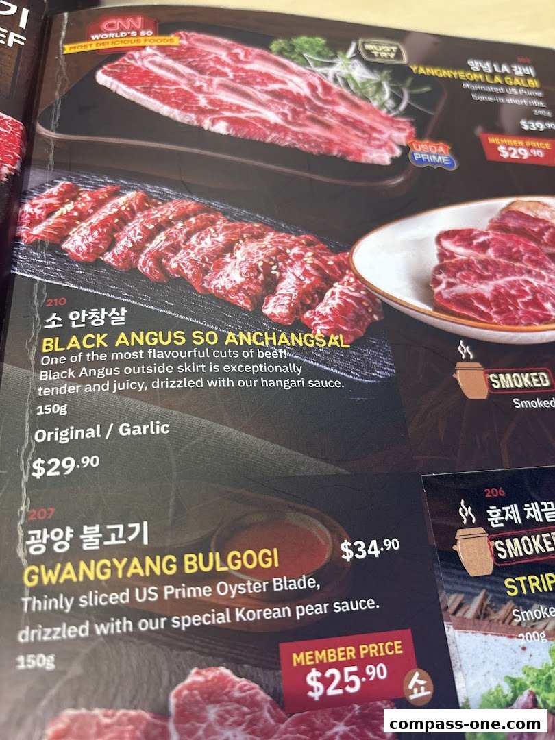 A menu featuring premium cuts of beef, including Black Angus and marinated short ribs.
