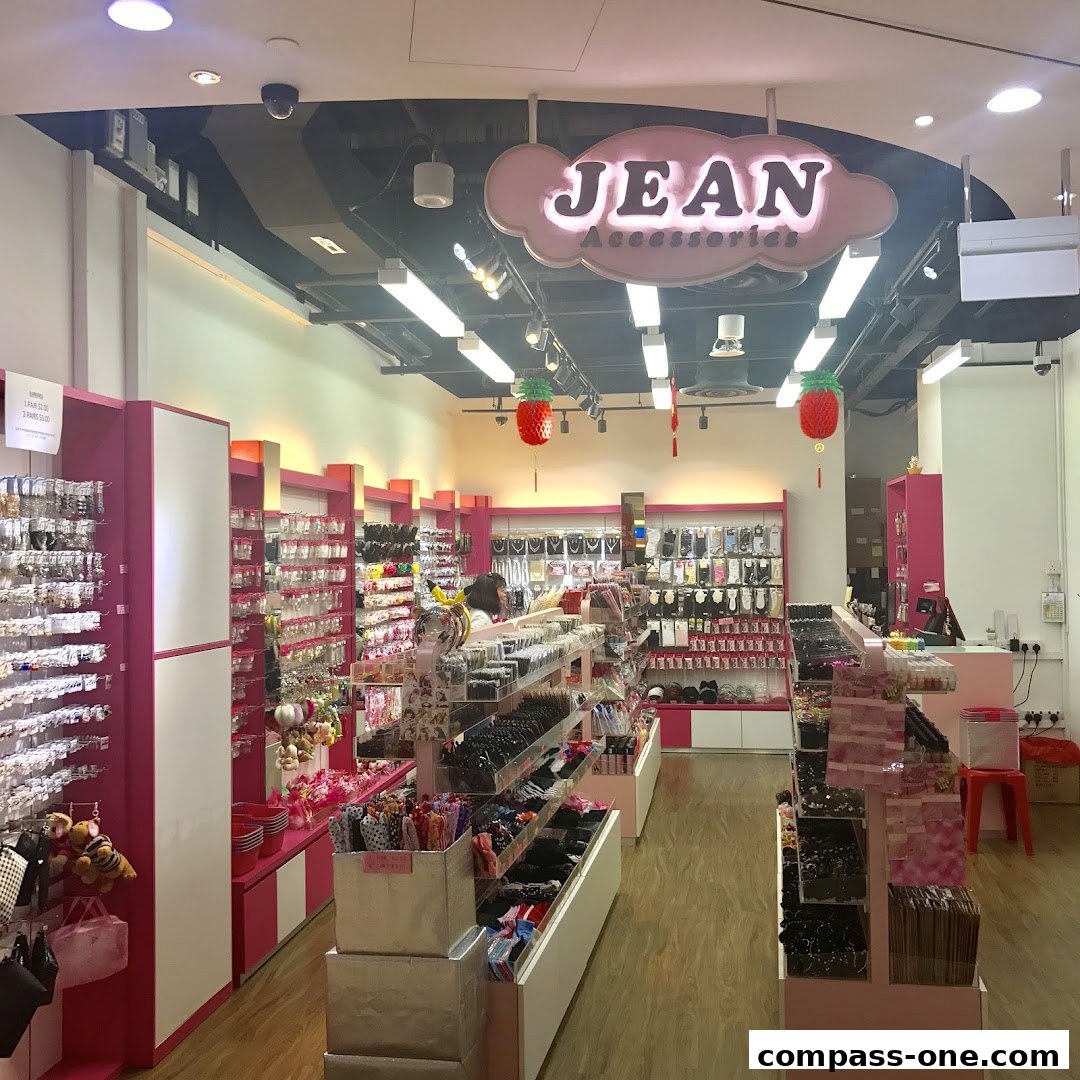 Interior view of a brightly lit shop selling a wide variety of hair accessories and jewelry.