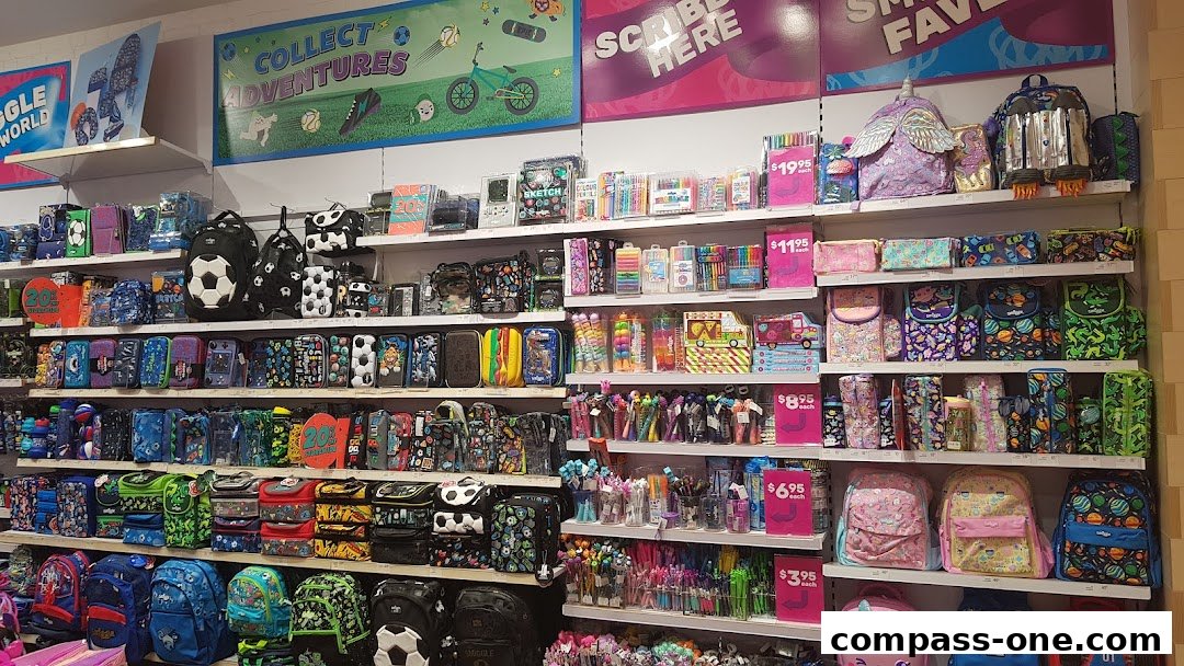 A brightly lit retail store interior showcasing a wide variety of colorful backpacks and stationery items.