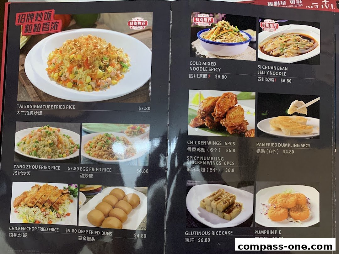 A menu from Fu Qi Grilled Fish showcasing various fried rice, chicken dishes, noodles, and desserts.