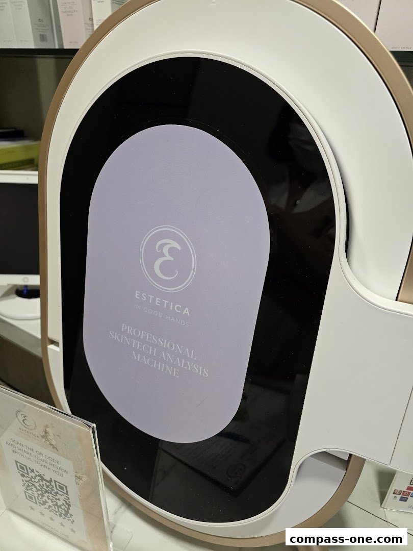 Estetica Beauty's professional skin analysis machine with a QR code for reviews.