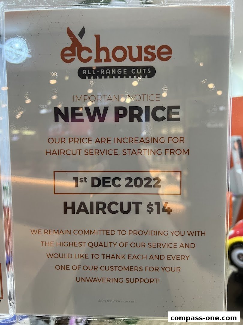 A notice from EC House All-Range Cuts announcing a new price for haircuts.
