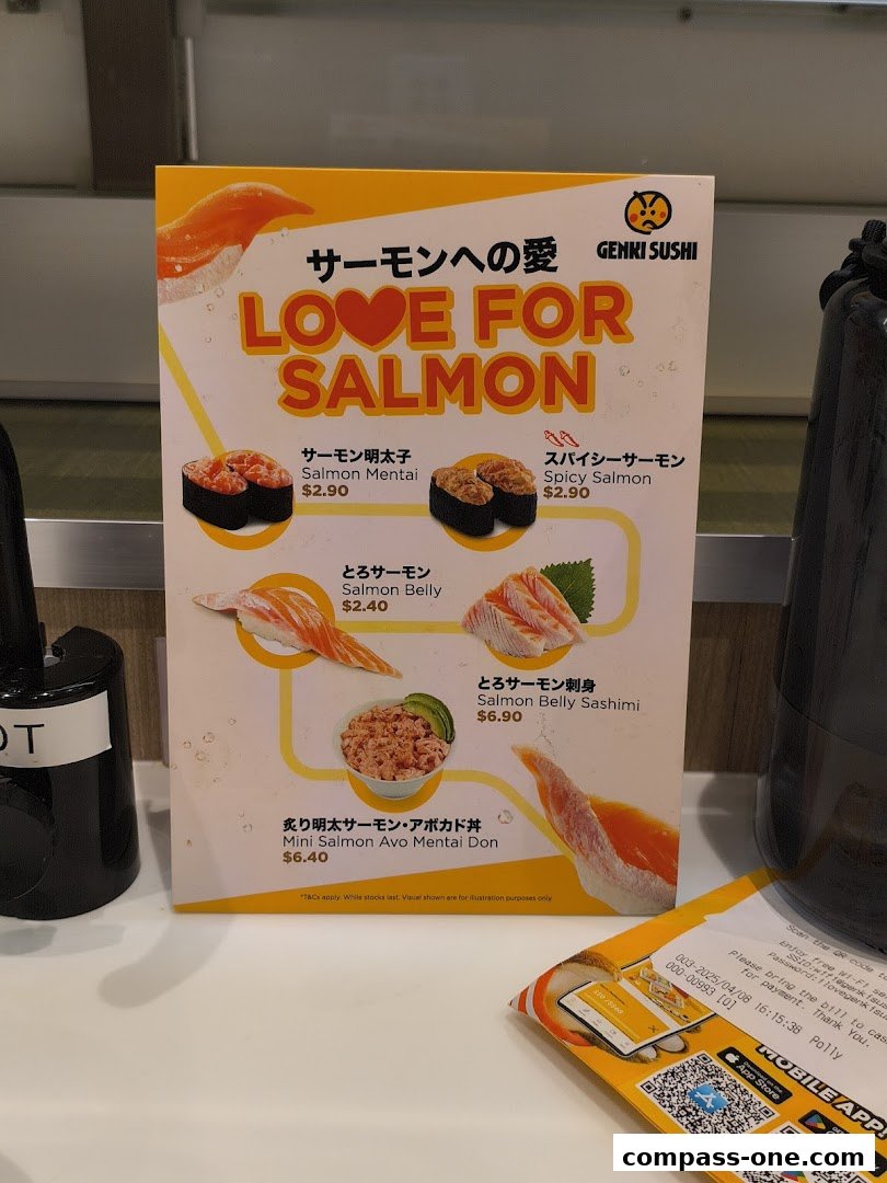 A menu board from Genki Sushi featuring various salmon sushi dishes and a salmon don.