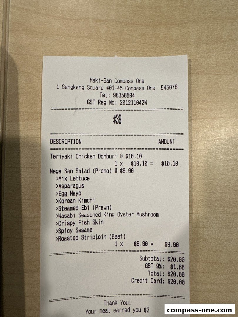 A receipt from Maki-San Compass One detailing food items and their prices.