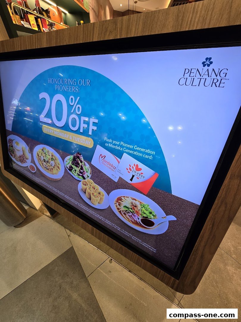 A digital display advertises a 20% discount for pioneers at Penang Culture.