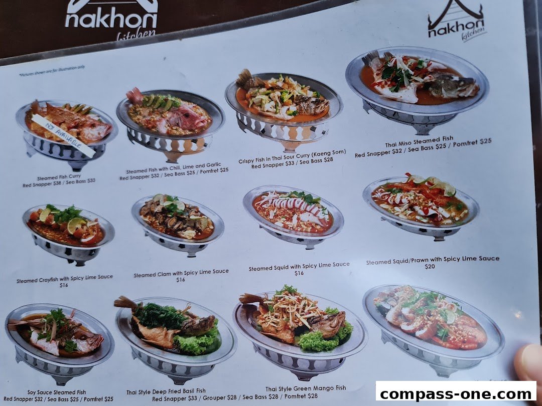 A menu from Nakhon Kitchen showcasing various steamed fish and seafood dishes with prices.
