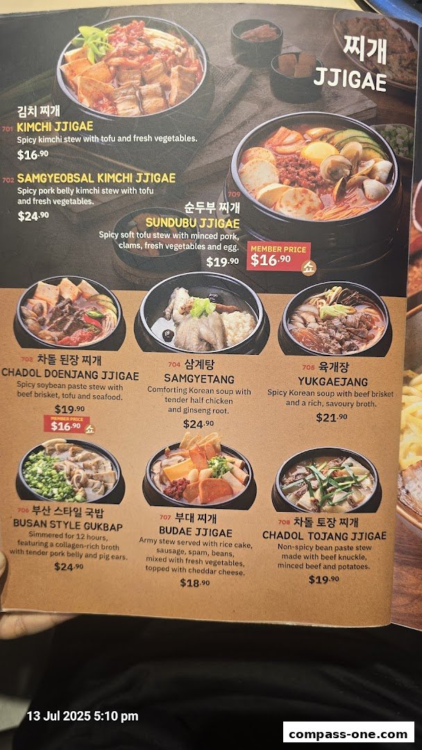 A menu showcasing various Korean stews and soups with appetizing images and descriptions.