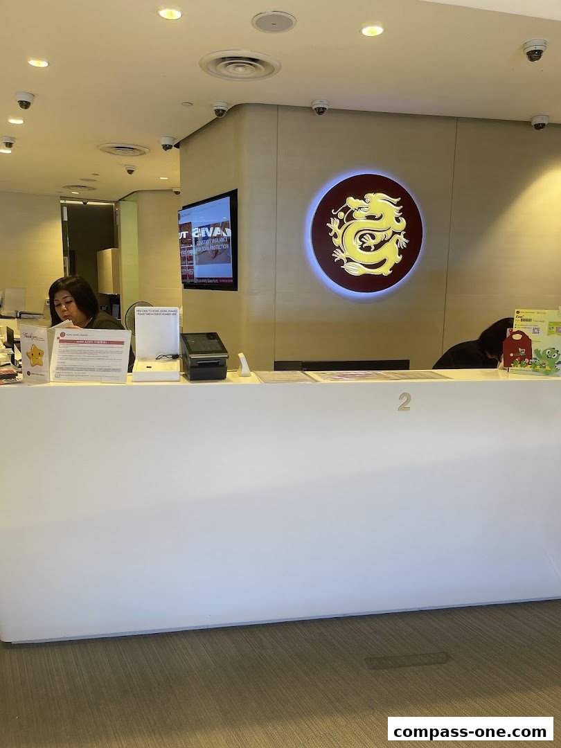 Hong Leong Finance counter with staff and a dragon logo.
