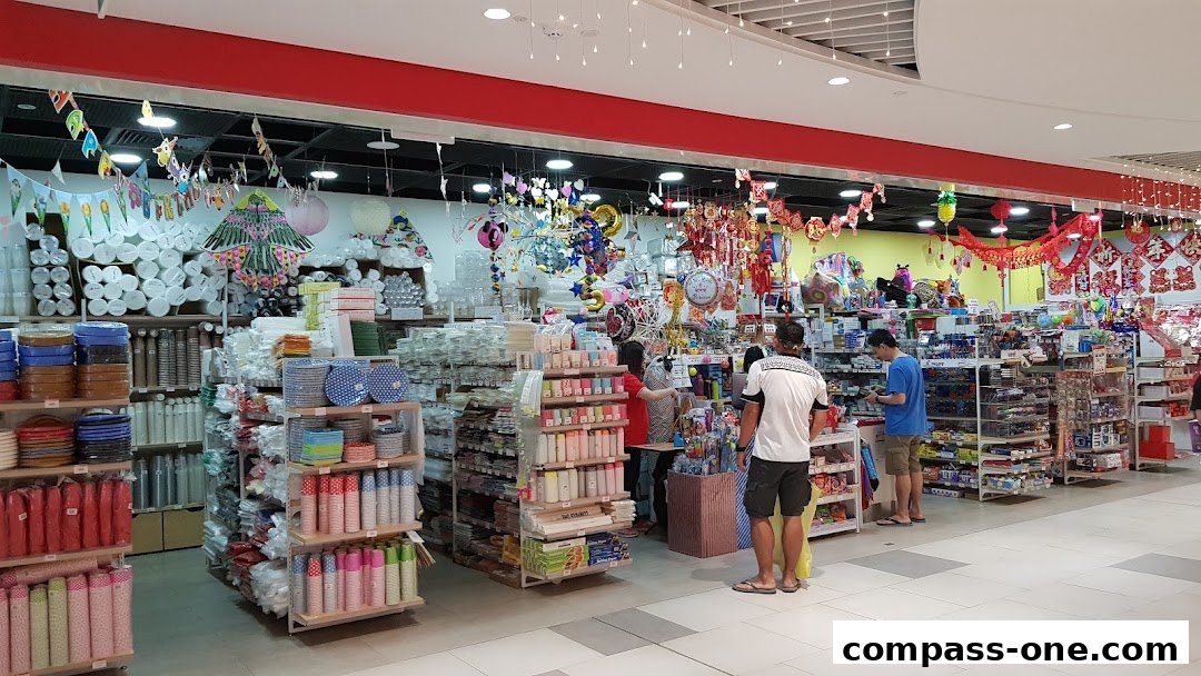 A well-stocked retail store with a wide variety of party supplies and decorations.