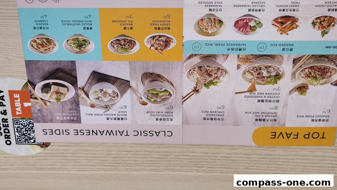 A menu from Eat 3 Bowls featuring classic Taiwanese sides and top favorites with food images.