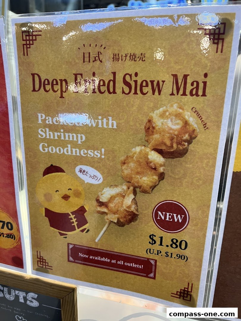 A sign advertising Deep Fried Siew Mai, packed with shrimp goodness, for $1.80.