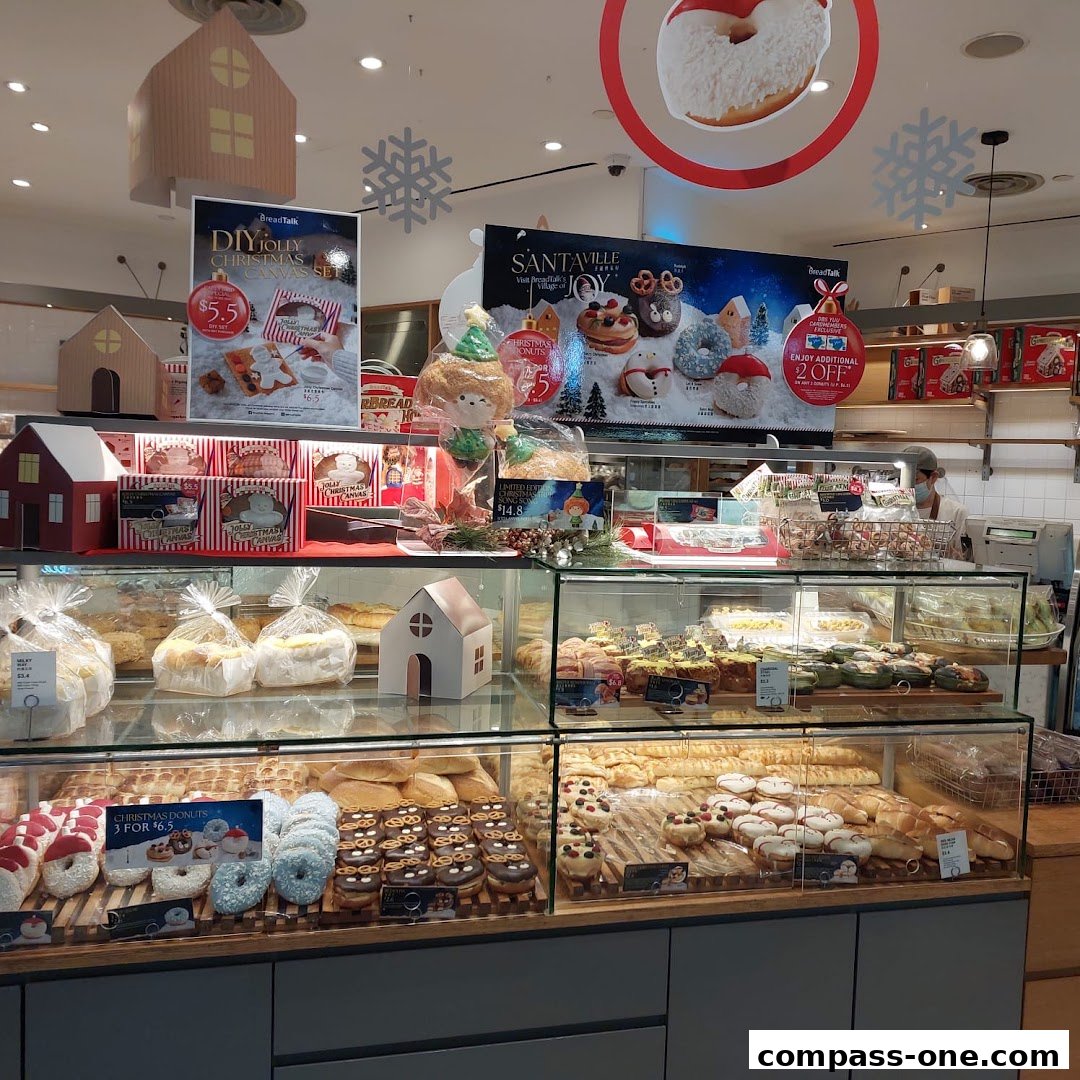 A display of festive Christmas-themed donuts and pastries at BreadTalk.
