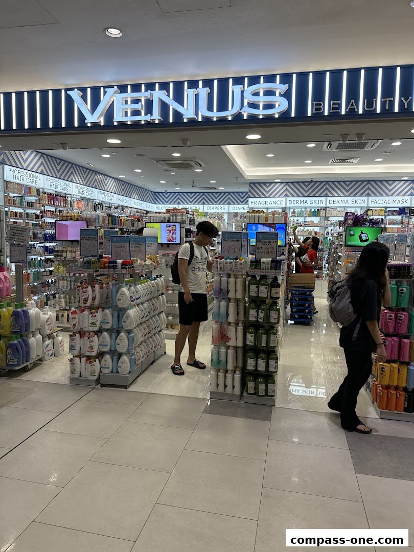 The entrance of Venus Beauty store, showcasing a wide variety of personal care products and cosmetics.