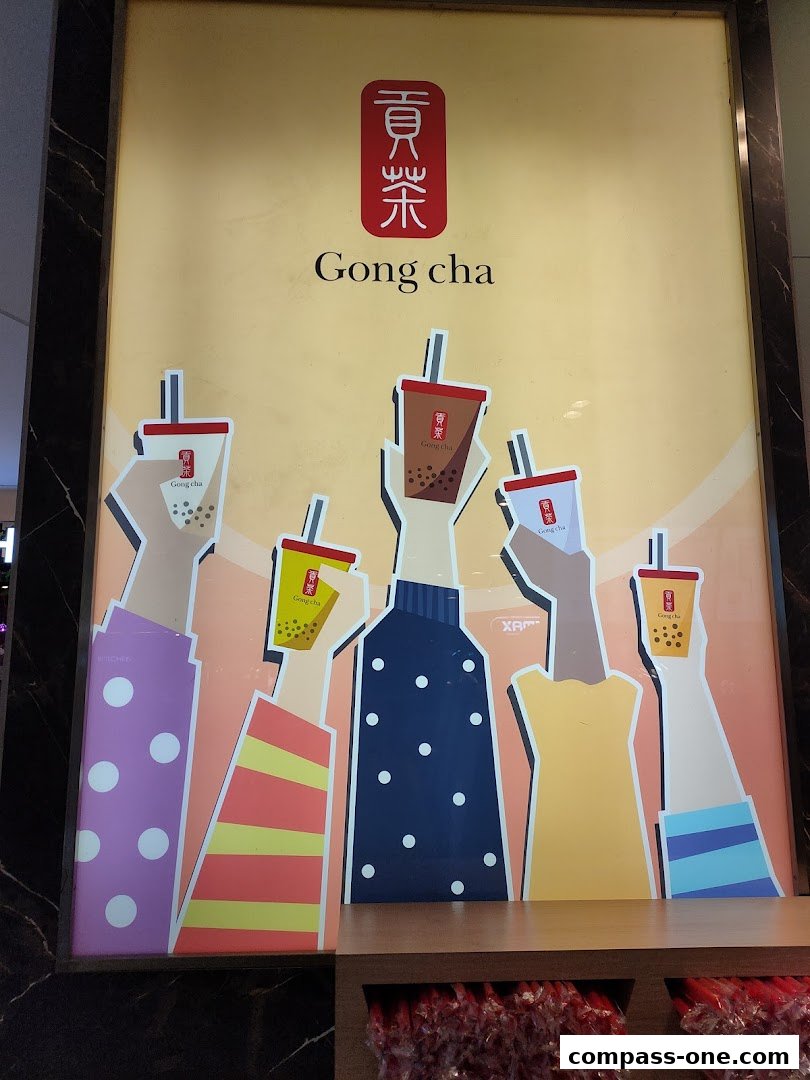 A vibrant poster featuring multiple hands holding Gong Cha bubble tea cups.