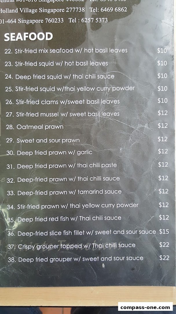 A menu from Nakhon Kitchen featuring a variety of seafood dishes with prices.