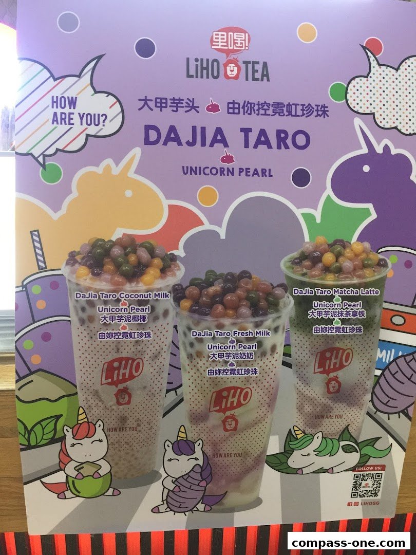 A promotional poster for LiHO TEA featuring three 'Dajia Taro Unicorn Pearl' drinks with cartoon unicorns.