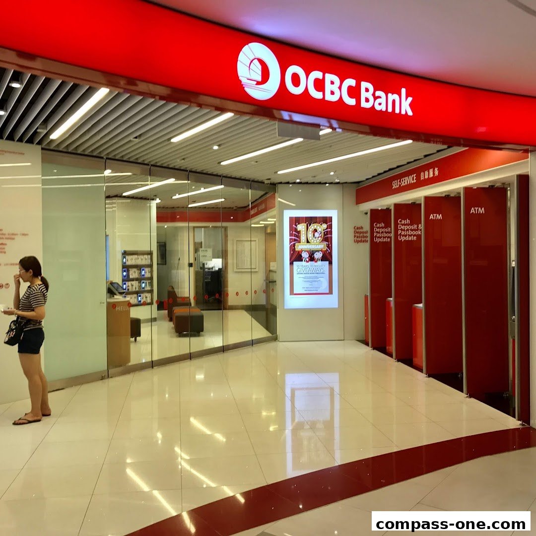 The entrance of OCBC Bank with self-service ATMs and a promotional giveaway poster.