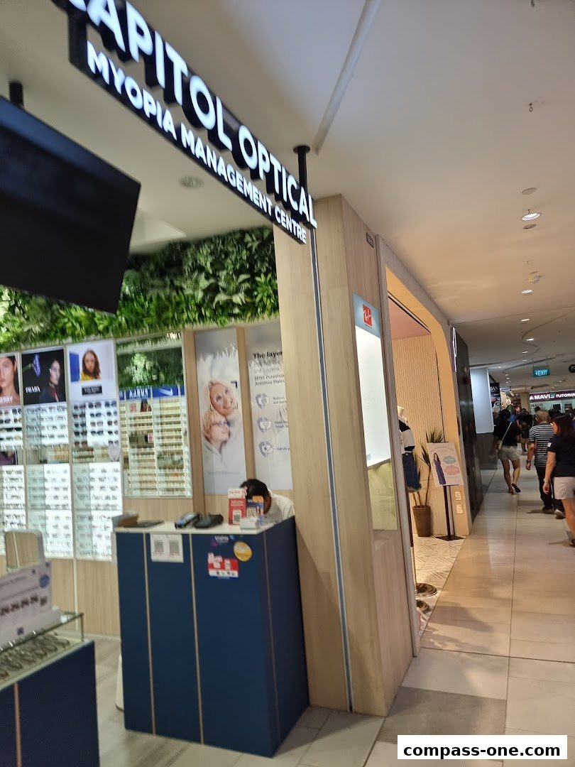 Capitol Optical shop front with displays of eyewear and a myopia management centre sign.