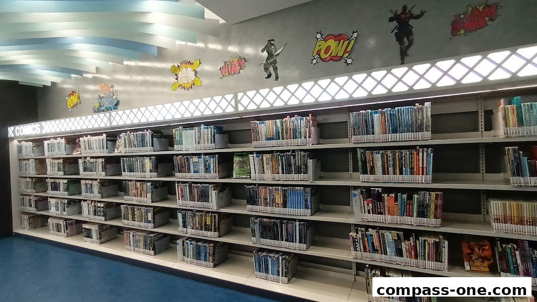 Shelves filled with books and comics, decorated with superhero imagery and comic book sound effects.