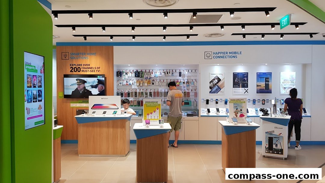 Interior of a StarHub store showcasing mobile phones, home solutions, and promotional displays.