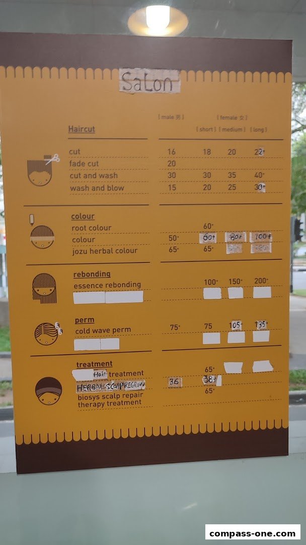 A price list for a hair salon with services like haircut, color, rebonding, perm, and treatment.