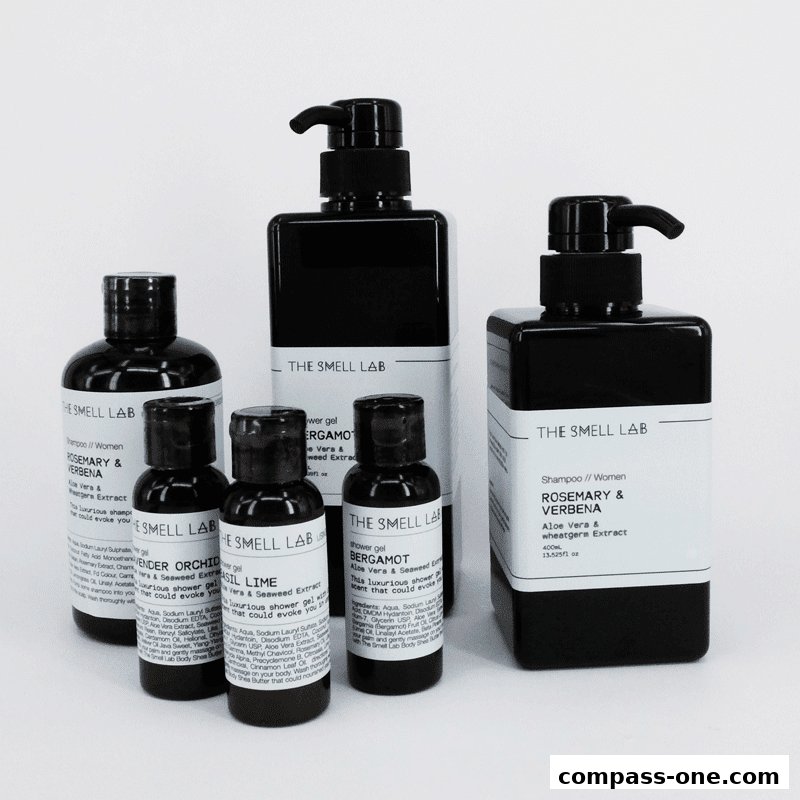 A collection of black bottles with white labels from The Smell Lab, featuring shampoos and shower gels.