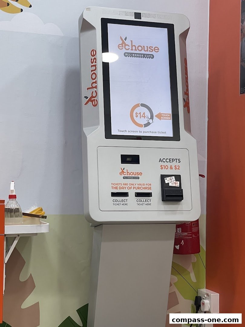 A self-service kiosk for EC House All Range Cuts, displaying ticket purchase options.