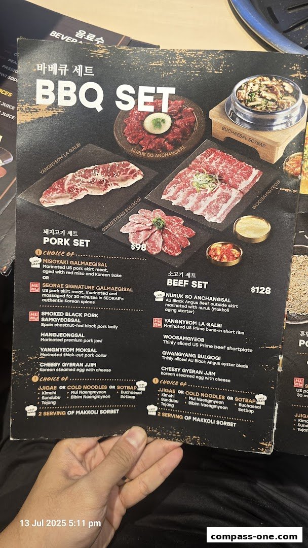 A menu showcasing Korean BBQ sets with pork and beef options, including side dishes.