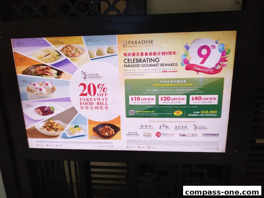 A promotional sign for Canton Paradise celebrating its 9th anniversary with takeaway discounts.