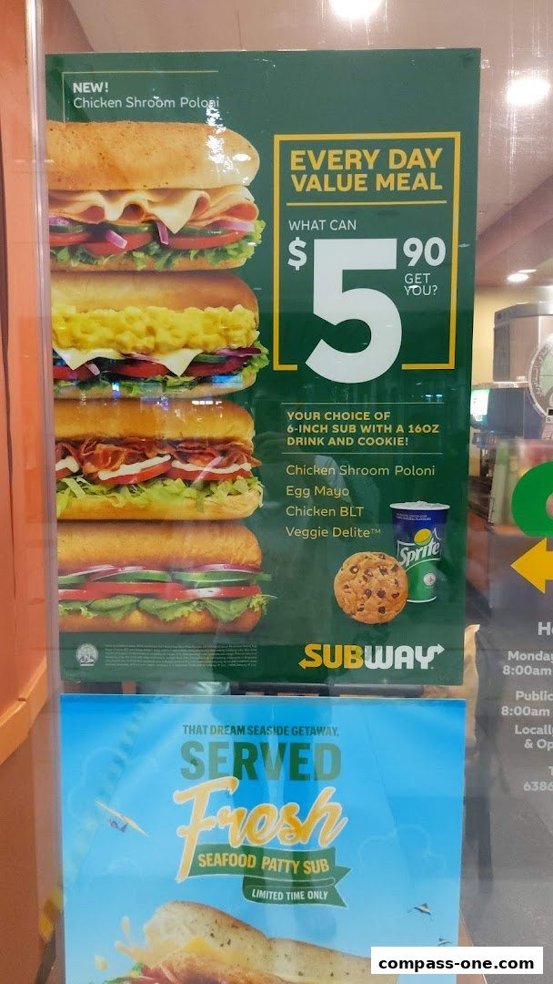 A Subway menu board featuring value meals and a limited-time seafood sub.