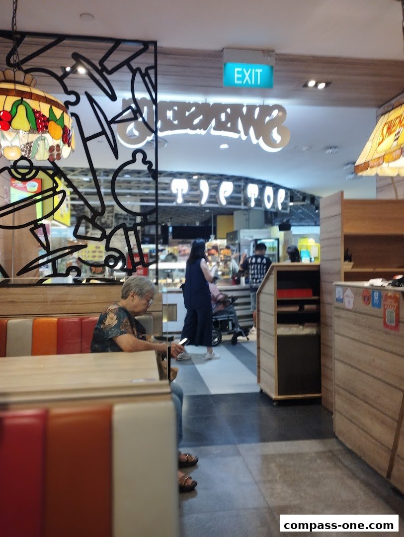 Interior view of Swensens restaurant with seating and the shop's logo visible.