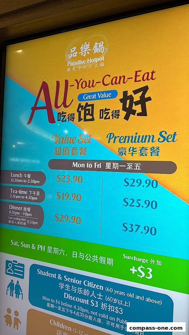 A menu board for Paradise Hotpot showcasing All-You-Can-Eat Value and Premium Sets with prices.