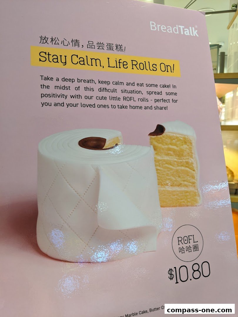 A promotional flyer for BreadTalk featuring a cake shaped like a roll of toilet paper.