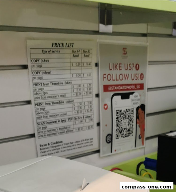 A price list for copying, printing, and scanning services at Standard Photo.