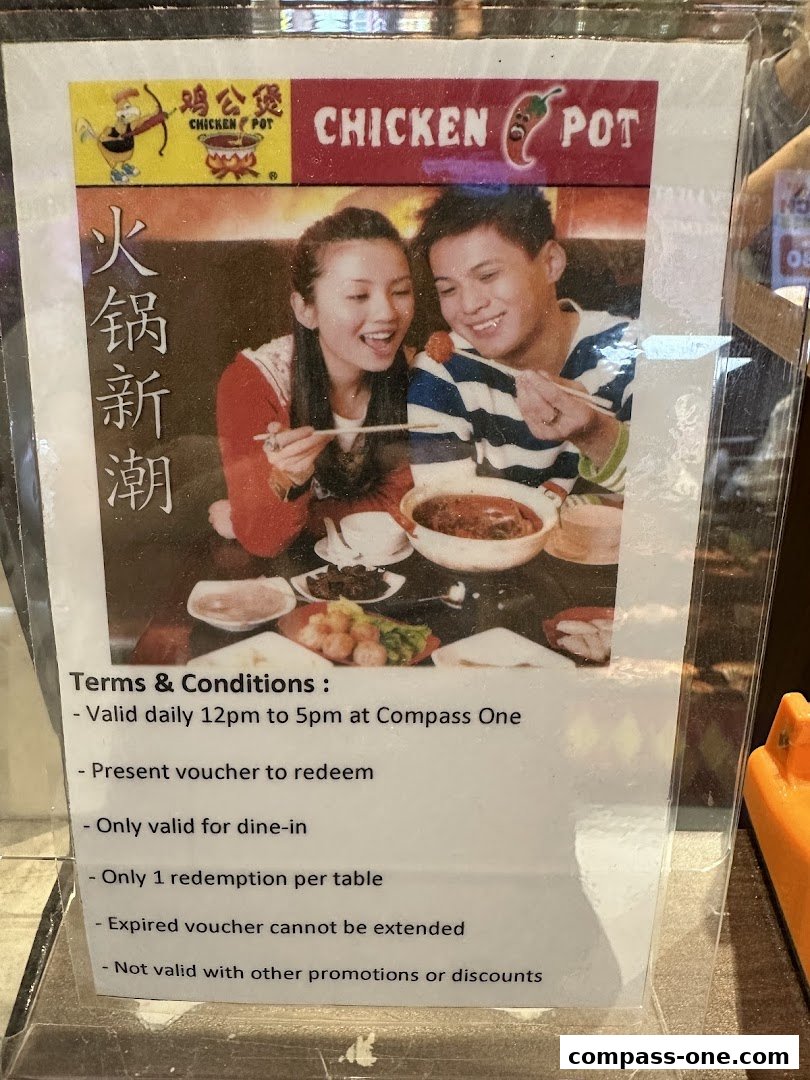 A promotional flyer for Chicken Hotpot featuring a couple enjoying a meal and terms and conditions.