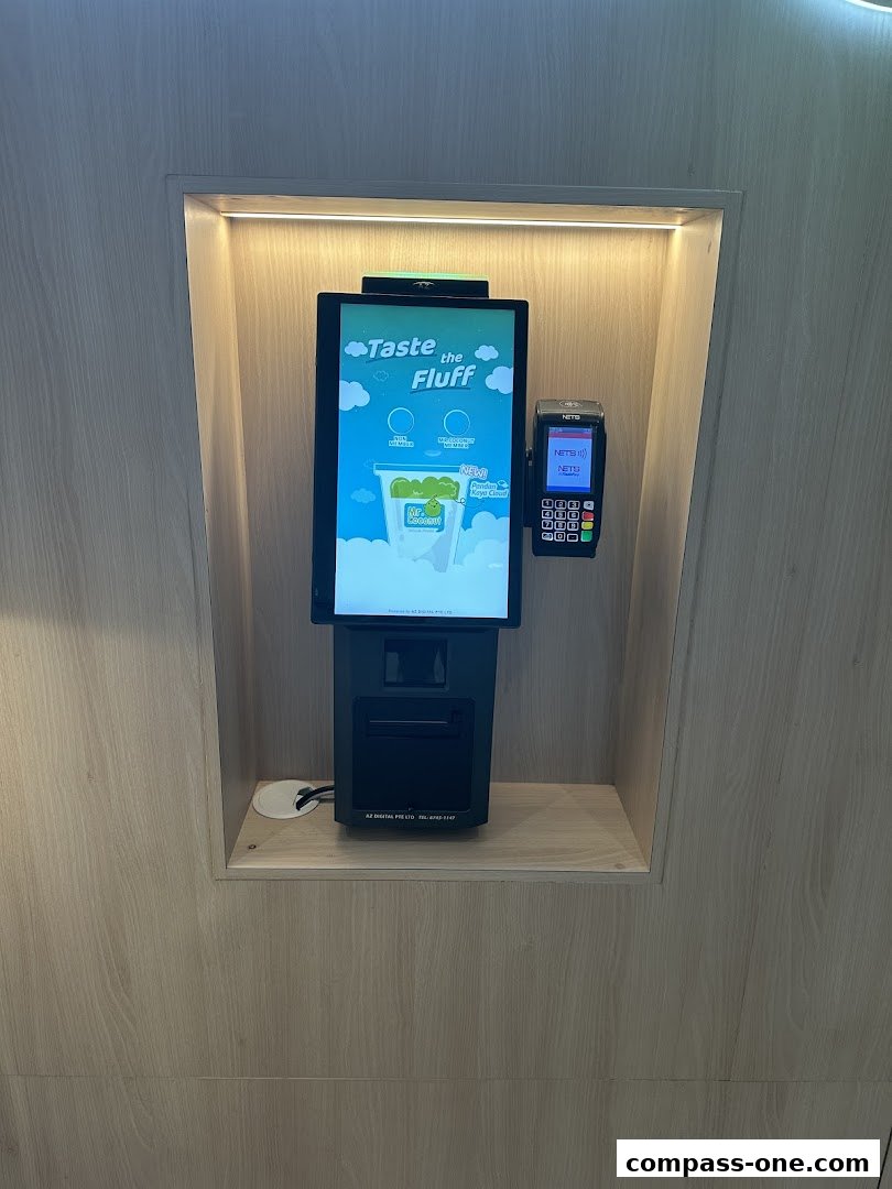 A self-order kiosk and payment terminal for Mr. Coconut at Compass One.
