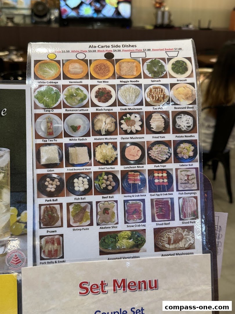 A menu displaying various ala-carte side dishes for hotpot, with images and prices.