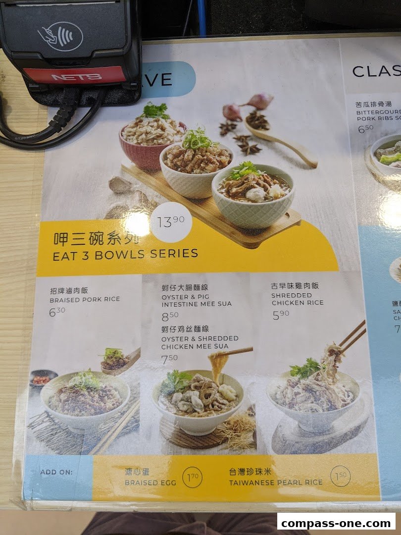 A menu from Eat 3 Bowls featuring various rice and noodle dishes with prices.