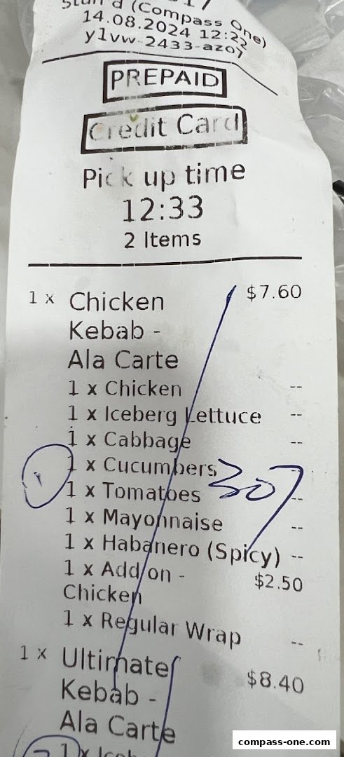 A receipt from Stuffd showing a prepaid credit card order with two items.