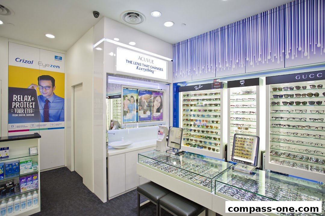 Interior of an optical shop showcasing a wide selection of eyeglasses and contact lenses.