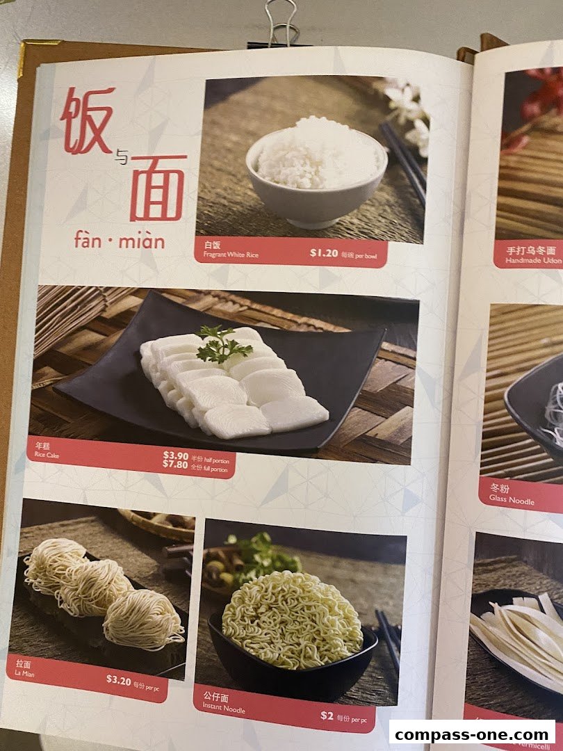 A menu page showcasing various rice and noodle dishes with prices.