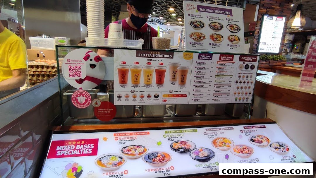 A menu display for Nine Fresh Desserts Taiwan, showcasing iced teas and mixed base dessert specialties.