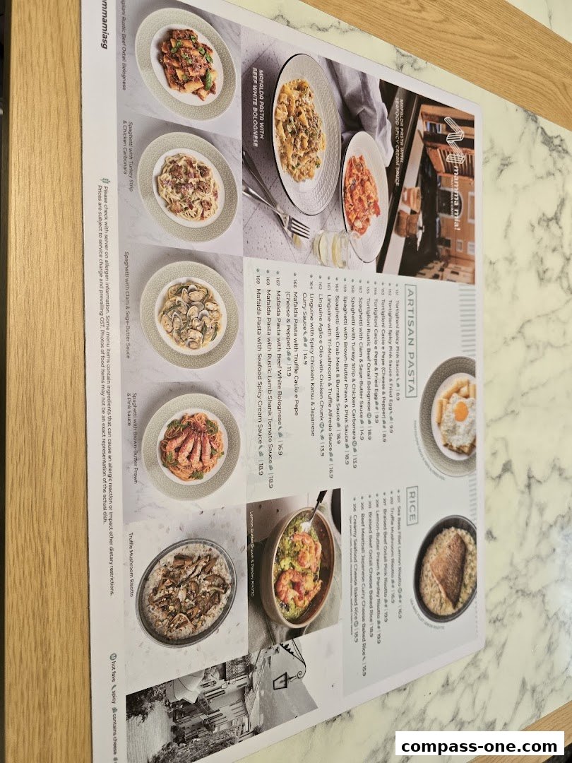 A menu from Mamma Mia Trattoria E Caffè featuring pasta and rice dishes with enticing photos.